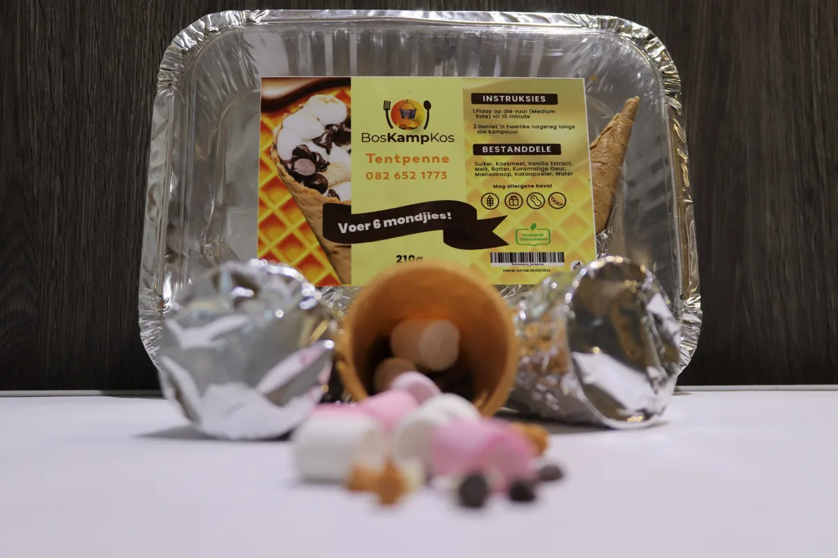 BosKampKos Tentpenne foil tray with sugar cones, marshmallows and chocolate ready for the coals