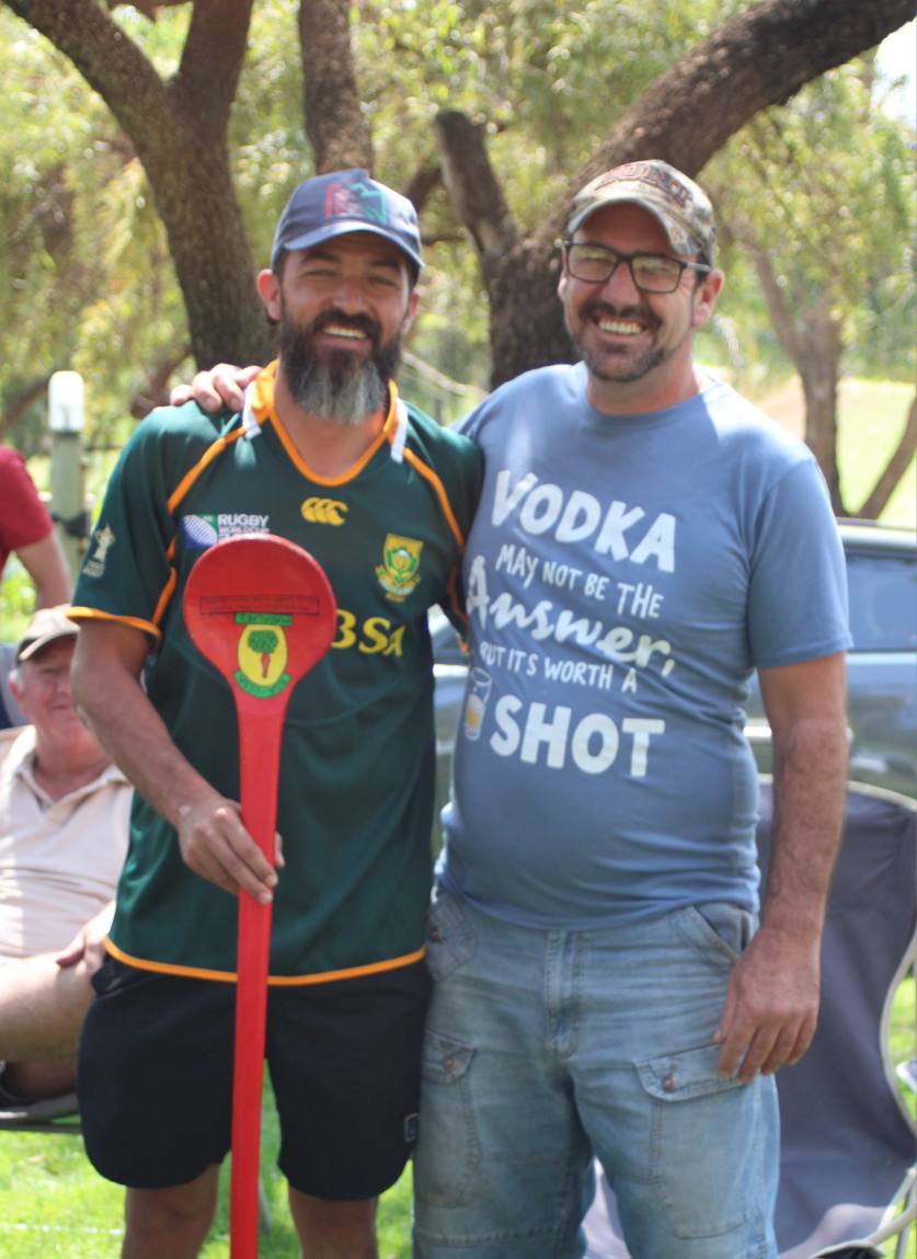 CCSA Magalies Region members with a jukskei bat at a rally in the North West
