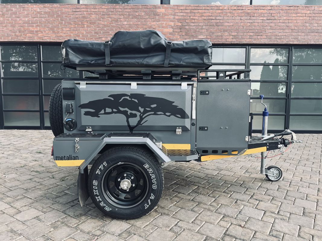 Metalian Genie stainless steel compact camping trailer available for rental on Kampi